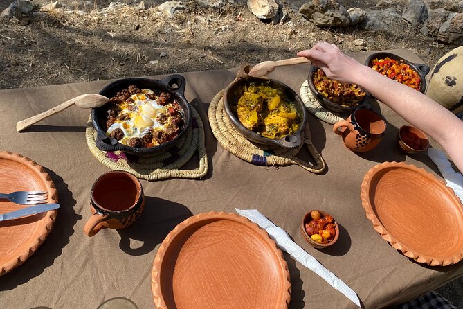 3-Hour Cooking Class overlooking the Blue City - Preparing your tajine over an open fire