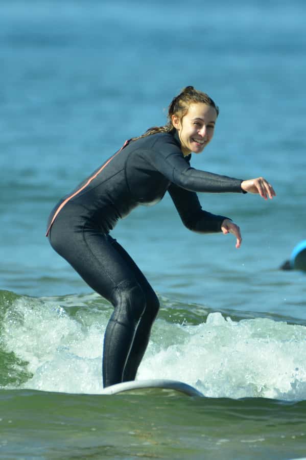 Agadir: Beginner Surf Lesson – Equipment Included - Moving into knee-to-waist-deep water
