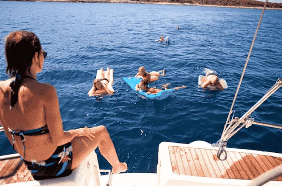 Agadir: Boat Trip with Fishing, Swimming, and BBQ Lunch - Fishing with help from the crew