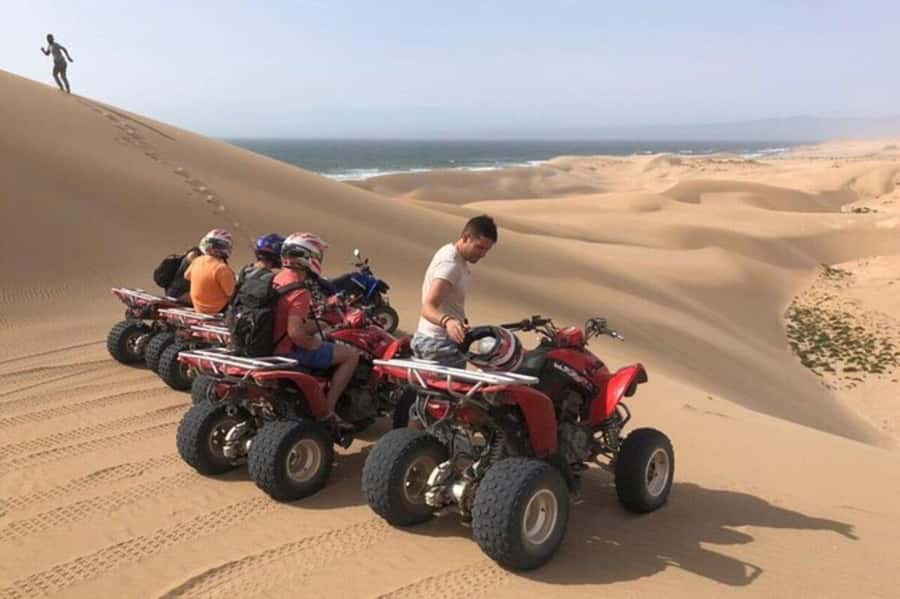 Agadir/Taghazout: Beach Quad Bike & Desert Sandboarding Tour - The day begins with a pickup around Agadir