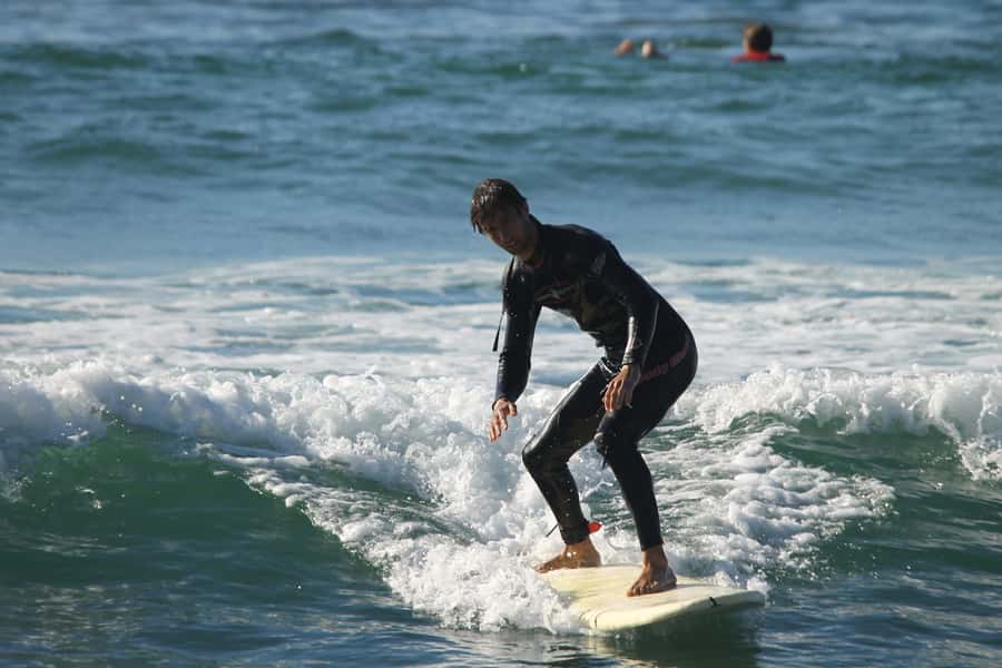 Agadir: Taghazout Beach Surf Lesson with Lunch and Transfer - Beach lunch under the umbrellas