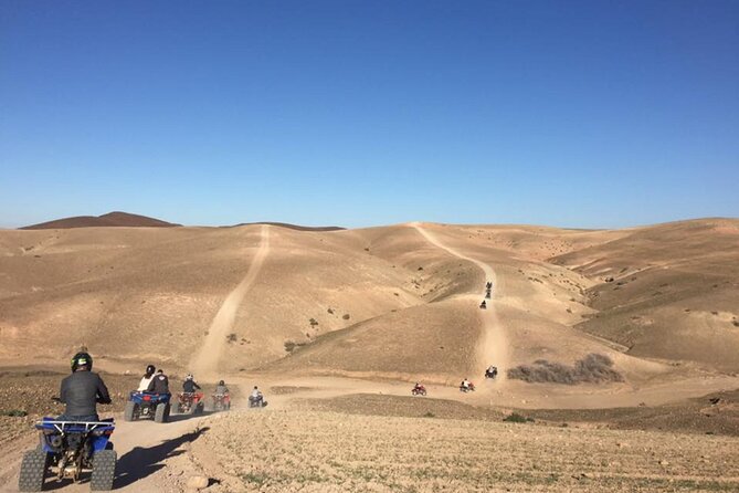 Agafay desert Family Package: Quad Bike & Camel Ride, Dinner Show - Quad biking across the Agafay Desert