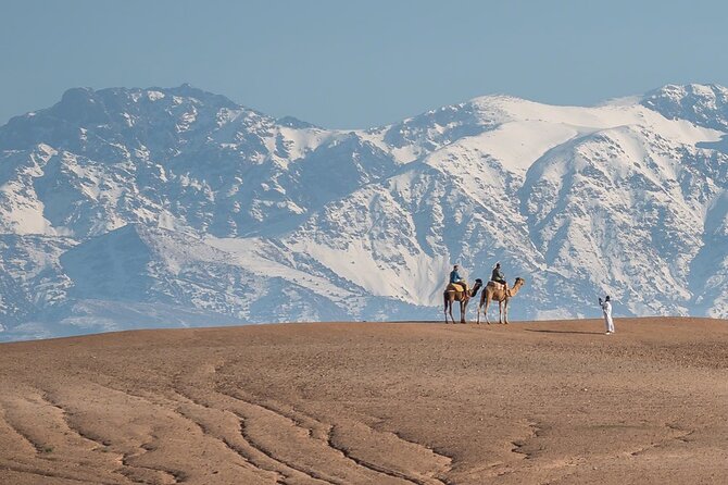 Agafay Desert Package, Quad Bike, Camel Ride and Dinner Show - Moroccan dinner in a candlelit camp