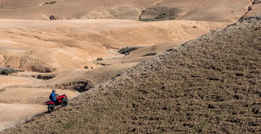 Agafay Desert: Quad Bike and Camel Ride Adventure Tour - Quad biking across real rocky terrain