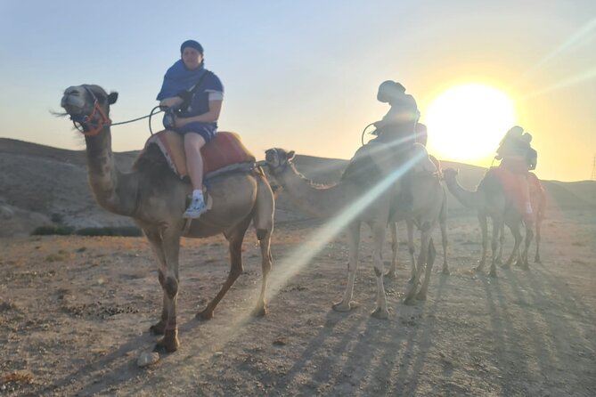 Agafay desert sunset camel ride Tour from Marrakech - Getting dressed for the camel ride