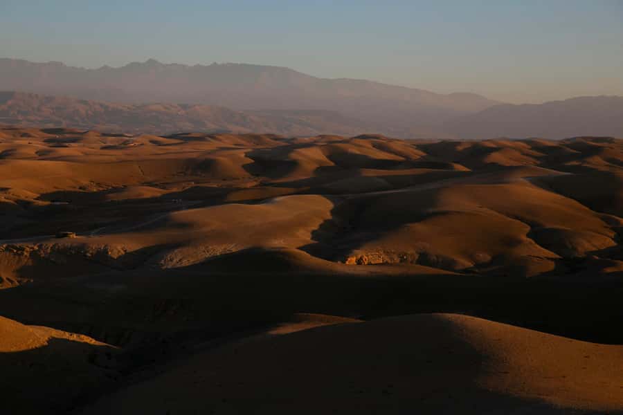 Agafay Tour: Sunset, Dinner, Camel ride, Quad and fire show - Dinner, Berber music, and the fire show