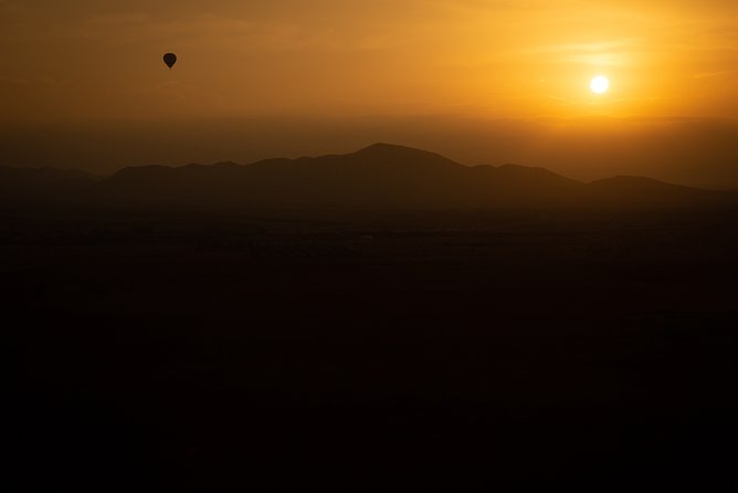 Atlas Mountains Hot Air Balloon Ride from Marrakech with Berber Breakfast and Desert Camel Experience - Tea, coffee, and the balloon setup