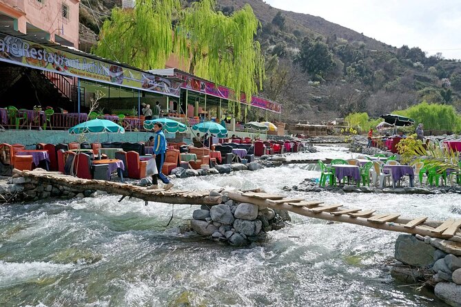 Day Trip from Marrakech Explore the Atlas Mountains and 4 Valleys - Asni: orchards, buildings, and the final valley