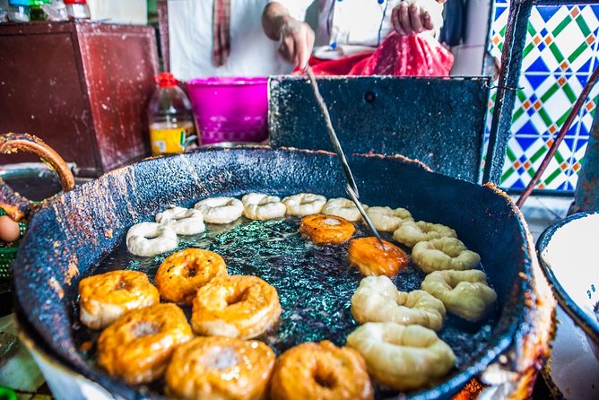 Evening Marrakech: Gastronomic and Market Tour Inside the Medina - Three tastings, including Moroccan snail soup
