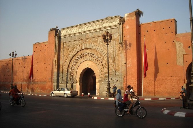 Exploring Marrakesh in half-day sightseeing tour - Menara Gardens for open space and mountain views