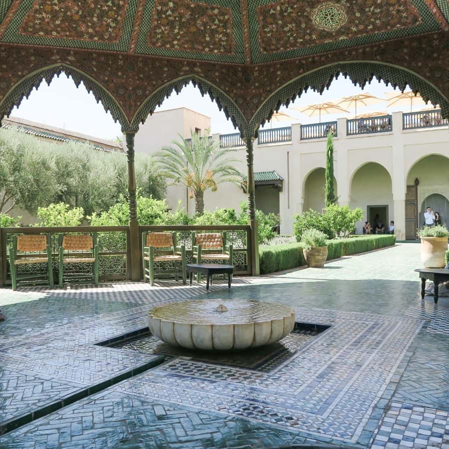 From Casablanca: Marrakech Guided Day Trip with Camel Ride - Walking the Medina and bargaining in the souks