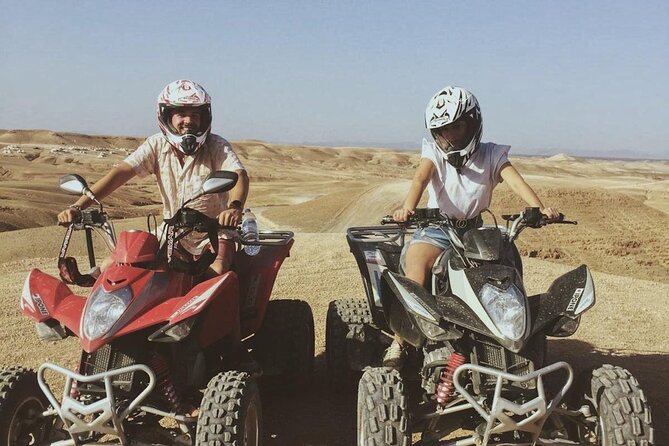From Marrakech: Agafay Desert Quad Biking at Sunset & Dinner Show - Music, dancing, and a fire show
