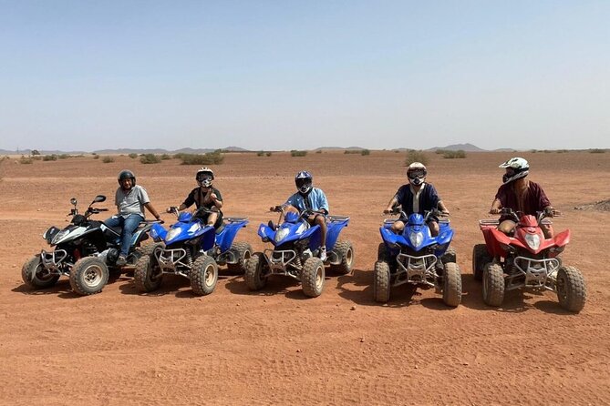 From Marrakech: Agafay Desert Quad Biking at Sunset & Dinner Show - Quad biking across the pale Agafay plateaus