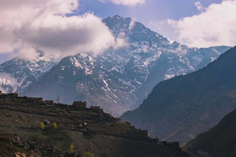 From Marrakech: Full-Day Atlas Mountain Berber Tour - The surprise camel ride and an important caution