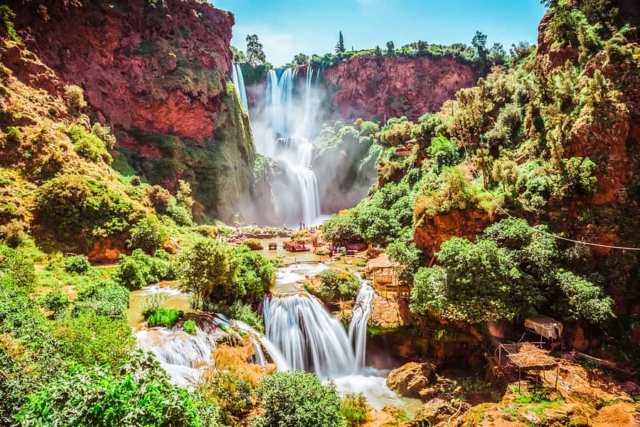 From Marrakech: Ouzoud Waterfalls Guided Tour & Boat Ride - Arriving above the red cliffs