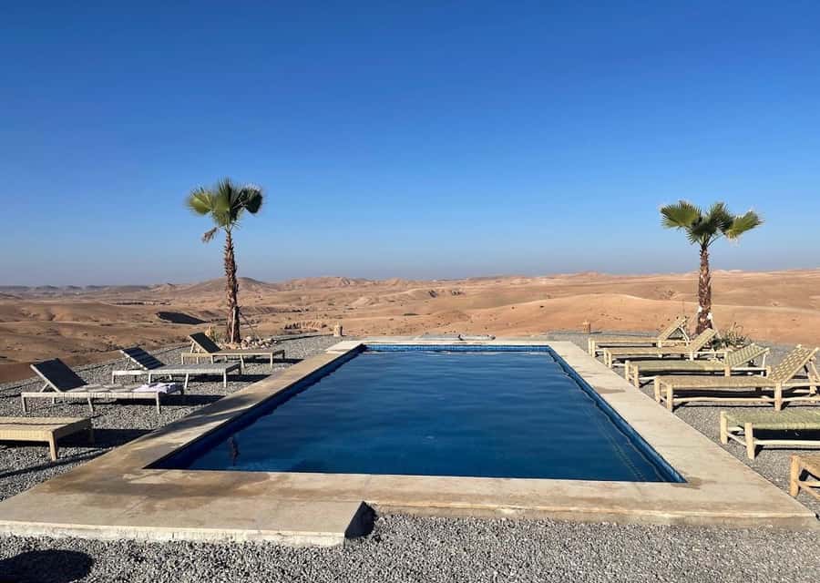 From Marrakech: Sunset Desert Tour with Camel Ride & Dinner - Camel riding through the desert at sunset