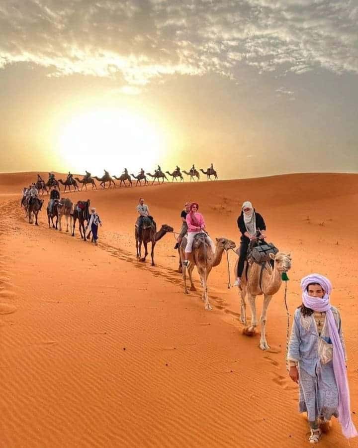 From Merzouga: Overnight Camel Trek over Erg Chebbi Dunes - Riding into the Erg Chebbi dunes