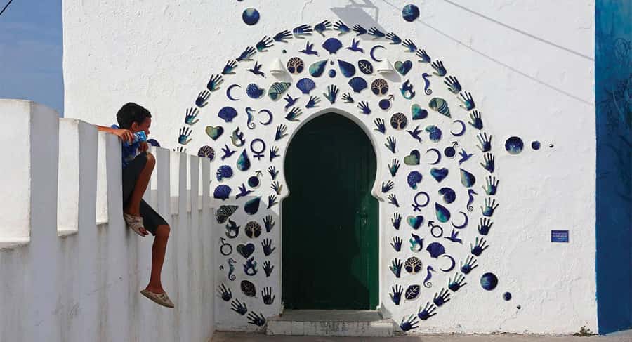 From Tangier: Asilah Day Trip with Cap Spartel & Camel Ride - Pickup from Tangier and the first green stop