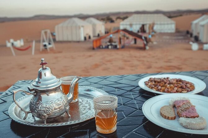 Luxury Camp in Merzouga Desert with Camel ride, Car 4WD - Erg Chebbi sunset, sandboarding, and photographs