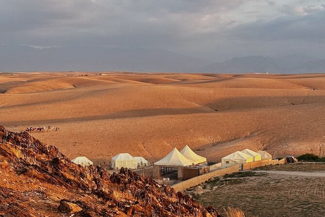 Magical dinner and sunset in Agafay desert - Walking uphill for the Agafay sunset