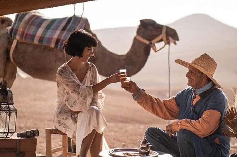 Marrakech: Agafay Desert Camel, Quad Bike & Dinner Show - Sunset on a camel in nomad dress