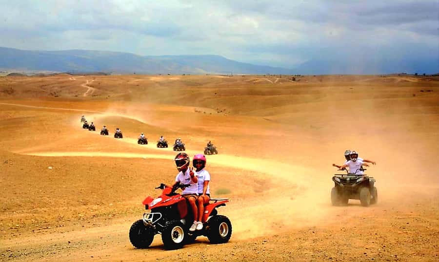Marrakech: Agafay Desert Dinner Show with Quad Bike & Camel - Dinner under the stars is the social center