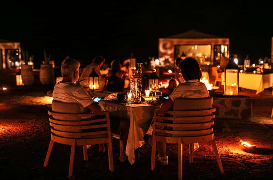 Marrakech: Agafay Desert Dinner Show with Sunset Camel Ride - Riding camels as the sun goes down