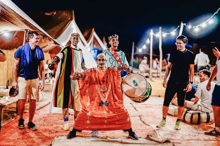Marrakech: Agafay Desert Pool, Dinner & Live Show Experience - Sunset from the rocky hills