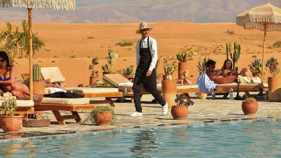 Marrakech: Agafay Desert Quad Camel Rides, Pool, Dinner Show - Cooling off at the desert pool