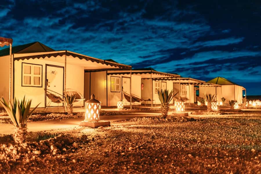 Marrakech: Agafay Desert Retreat, Tent, Dinner, Show & Pool - A generous Moroccan dinner with a stage built around it