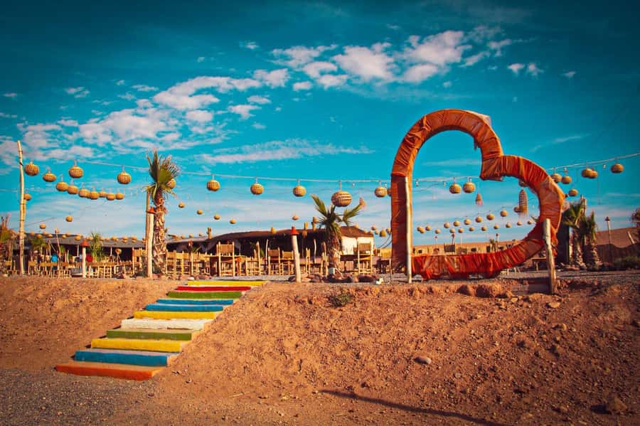 Marrakech: Camel Ride, Dinner, Pool, and Fire Show in Agafay - Drums, dancing, and a fire show under the stars