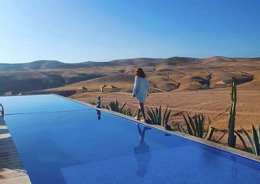 Marrakech: Day Pass in The Desert, swimming pool and lunch - Pool time with Atlas Mountain views