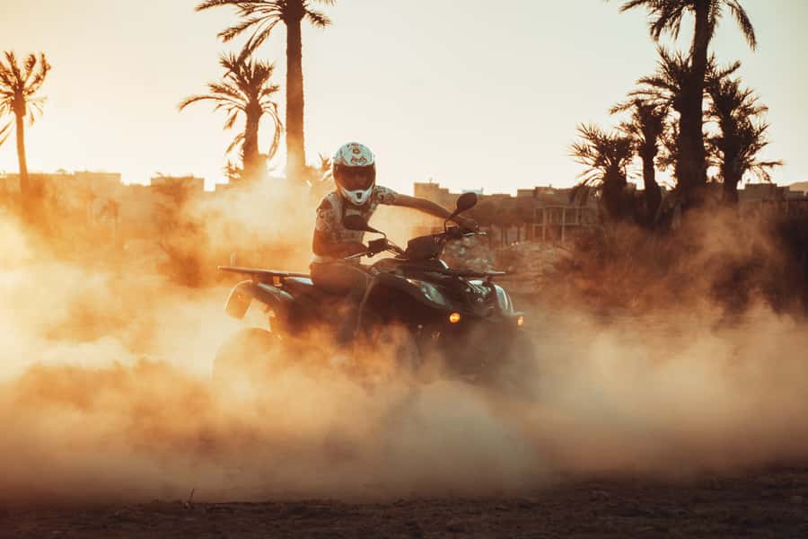 Marrakech: Desert and Palm Grove Quad Tour with Tea - Crossing the Rocky Desert on the Way Back