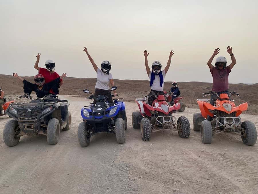 Marrakech: Desert Quad Bike Tour with Tea & Optional Dinner - Riding across rocky Agafay