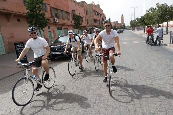 Marrakech Food Tasting Tour by Bike - Jemaa el-Fnaa, orange juice, and Koutoubia Mosque