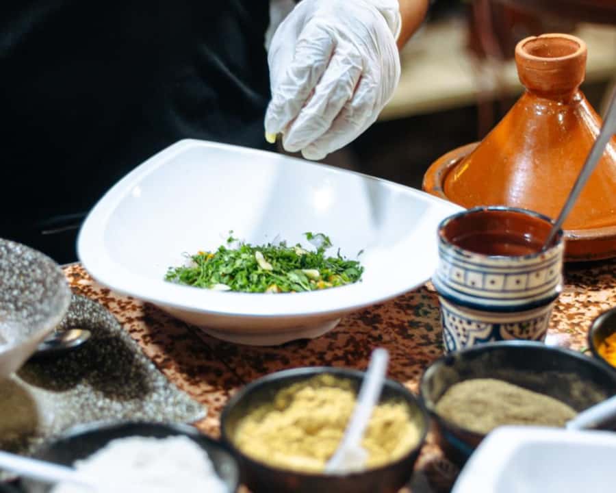 Marrakech: Moroccan Cooking Class with Pickup - Eating the Meal You Prepared