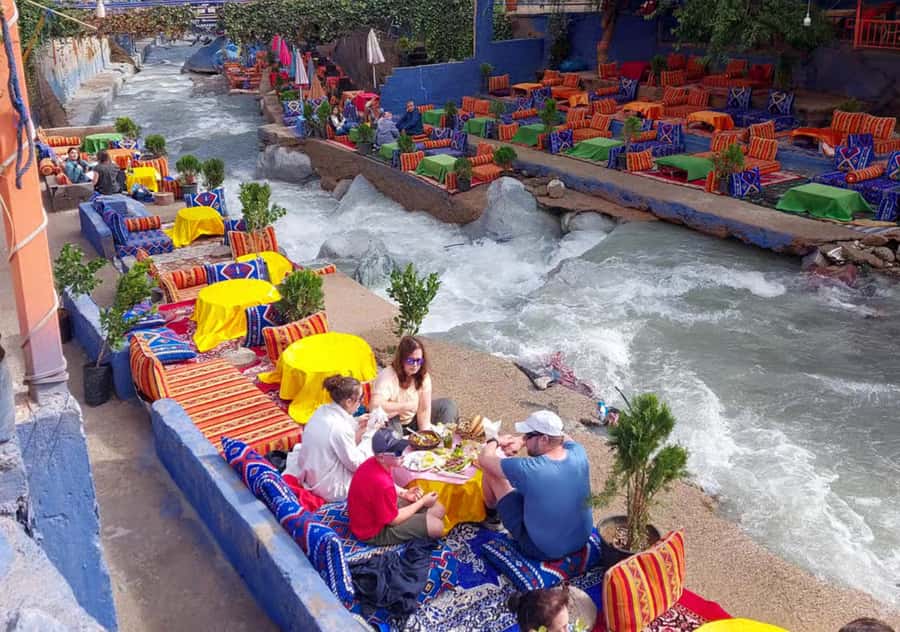 Marrakech: Ouzoud Waterfalls Trip, Guide & Boat + Lunch - Walking through olive groves to the first viewpoints