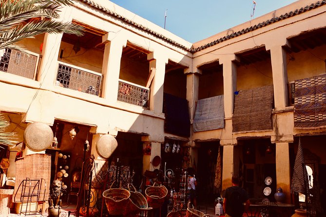 Marrakech Private Full-Day Walking Tour with Hotel Pickup and Drop-Off - Jemaa el-Fnaa when the city puts on a show