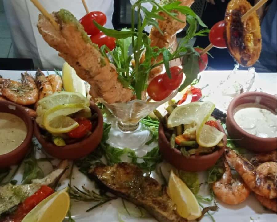 Marrakech: Restaurant Dinner Experience with Hotel Pickup - Pickup from your riad and the drive across Marrakech