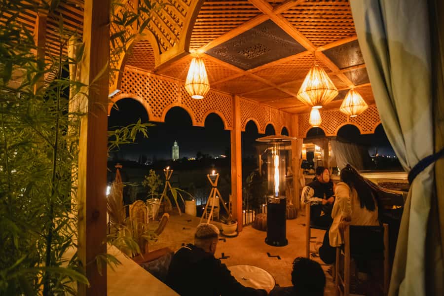 Marrakech: Rooftop Dinner with Koutoubia View - A small-group format with a firm table limit