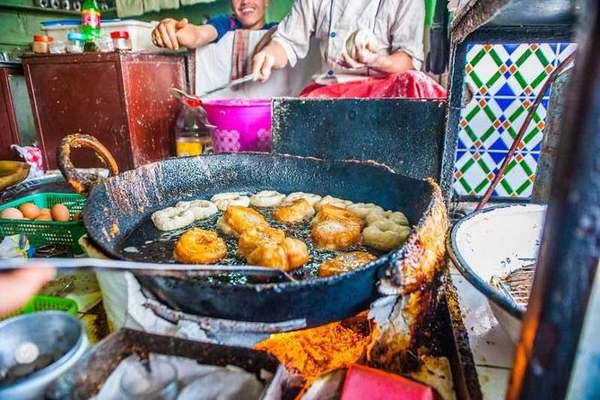 Marrakech: Street Food Tour by Night - Through the market near the Mellah
