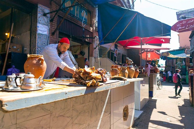 Marrakech: Street Food Tour by Night - Dates, olives, prickly pear, and side streets