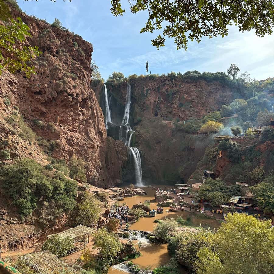 Marrakech to Ouzoud waterfalls day tour - Guide & boat ride - Walking down to the 110-meter cascades