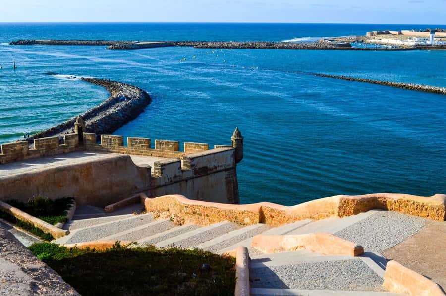 Rabat: Guided City Tour with Mausoleum Mohammed V Visit - Medina walls, markets, and the practical value of a guide