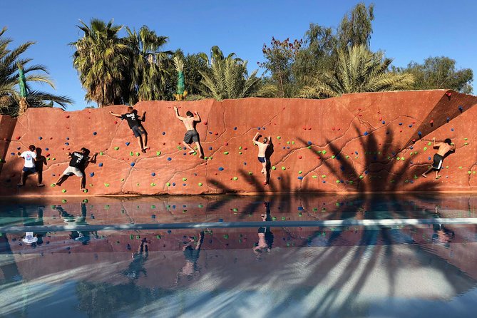 Skip the Line: Oasiria Water Park Admission Ticket - Slides and the climbing wall keep older children busy