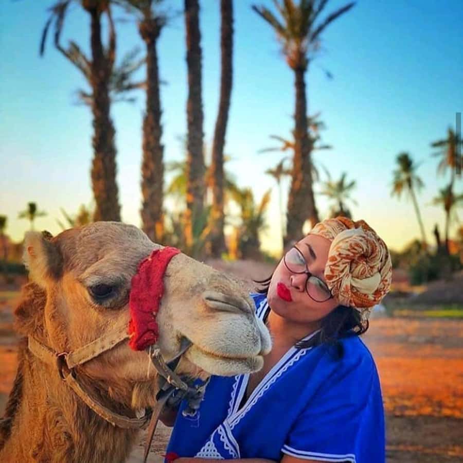 Sun set camel ride in palmerai of Marrakesh - Getting ready in nomadic dress