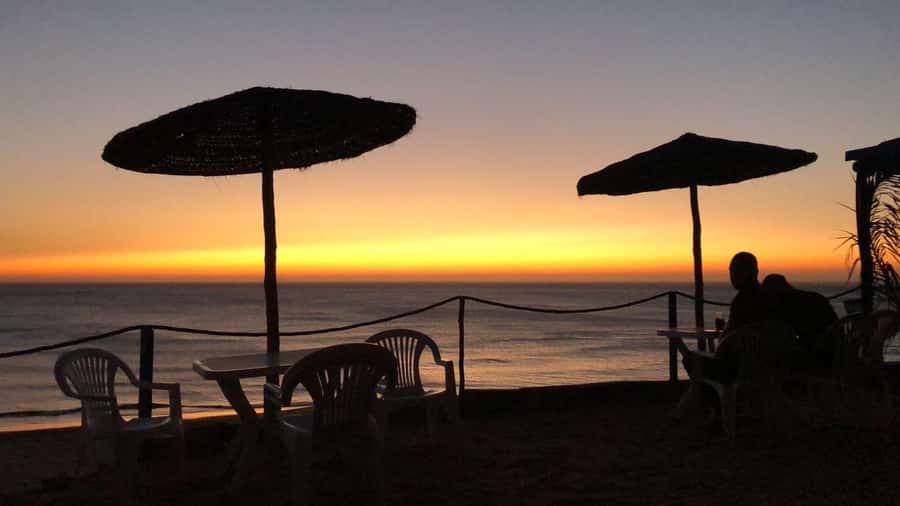 Tangier: Sunset, Tea, Sweets, Camel Ride, and Hercules Caves - Mint tea and date pastries at Bouhindiya